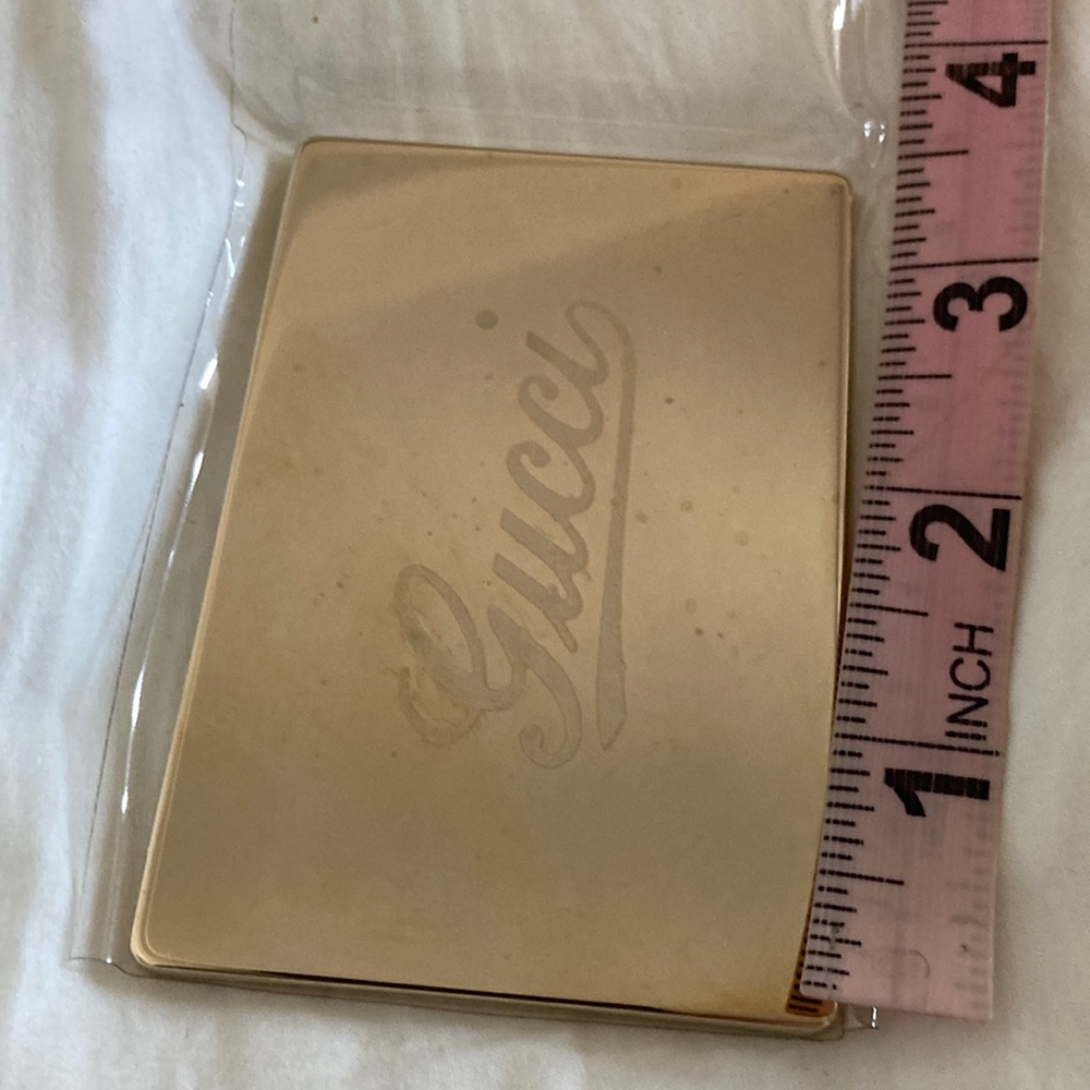 Gucci purse mirror